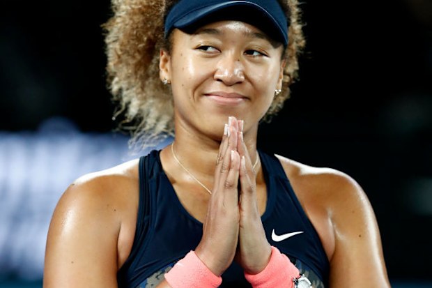 Naomi Osaka of Japan celebrates winning at Melbourne Park.
