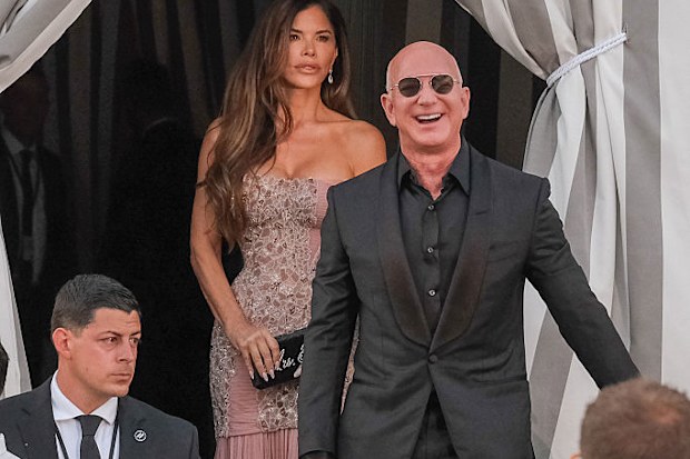 VENICE, ITALY - JUNE 28: Jeff Bezos and Lauren Sanchez are seen leaving the Aman Hotel for a party at the Arsenale on June 28, 2025 in Venice, Italy. (Photo by Stefano Mazzola/GC Images)