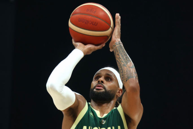 Patty Mills shoots a free throw. Australian Boomers