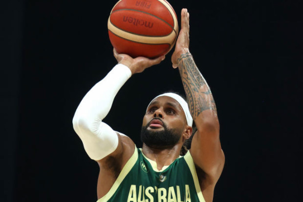 Patty Mills shoots a free throw. Australian Boomers