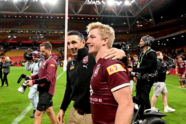Coach Billy Slater and Tom Dearden of Queensland celebrate victory after game three of the State of Origin Series at Suncorp Stadium in Brisbane. Photo: Bradley Kanaris