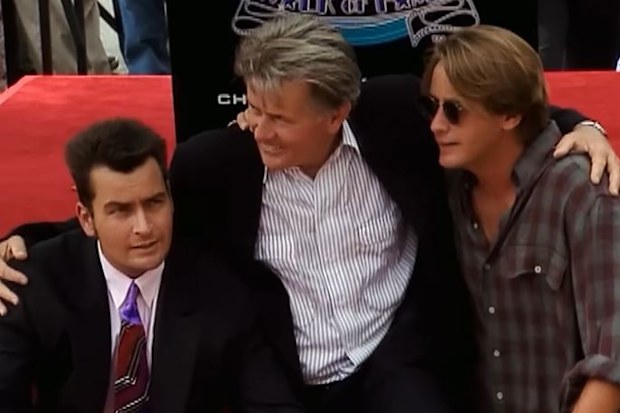 Charlie Sheen (left) with dad Martin Sheen (centre) and brother Emilio Estevez (right)