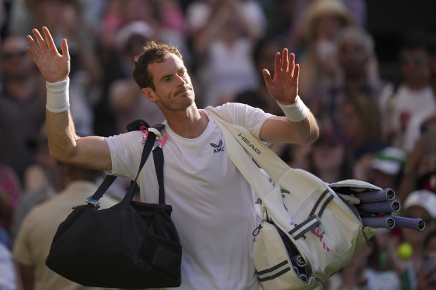 Britain's Andy Murray leaves the court after losing to Stefanos Tsitsipas of Greece at Wimbledon.