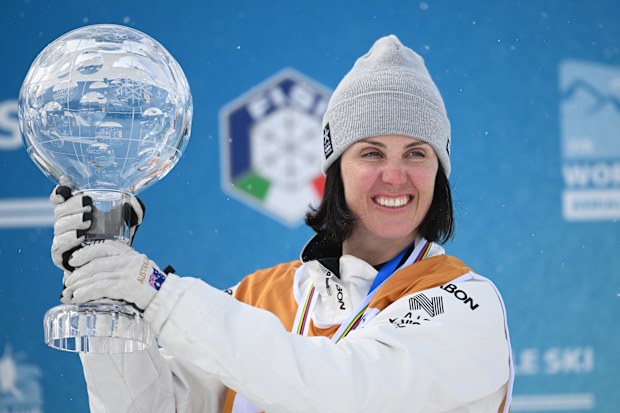LIVIGNO, ITALY - MARCH 13: Gold medalist Laura Peel of Team Australia celebrates on the podium with her FIS World Cup trophy after the Women's Aerials for the FIS World Cup Aerials & Moguls on March 13, 2025 in Livigno, Italy. The World Cup is an official test event for the XXV edition of the Winter Olympics, which will be held in Milan and Cortina d'Ampezzo in 2026. (Photo by Matthias Hangst/Getty Images)