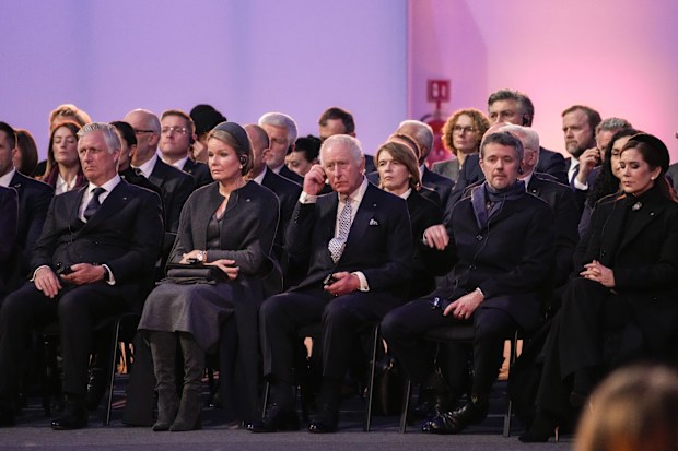 From left on the front row Belgium's King Philippe, Belgium's Queen Mathilde, Britain's King Charles III, Denmark's King Frederik X and Denmark's Queen Mary sit at the Auschwitz-Birkenau former Nazi German concentration and extermination camp, before a ceremony marking the 80th anniversary of its liberation, in Oswiecim, Poland, Monday, Jan. 27. 2025. (AP Photo/Czarek Sokolowski)
