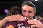 An emotional Billy Slater embraces Cameron Munster. 