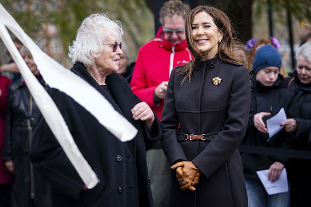 Denmark's Queen Mary and artist Kirsten Justesen, left, at the unveiling of the monument for Countess Danner at Danner in Copenhagen, Monday, Nov.25, 2024.  (Ida Marie Odgaard/Ritzau Scanpix via AP)