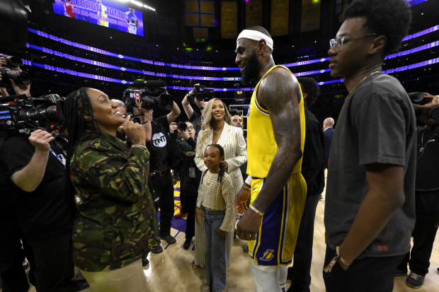 Los Angeles, CA - February 07:  LeBron James #6 of the Los Angeles Lakers celebrates with his mom Gloria James, left, and wife Savannah James, center, and daughter Zhuri James along with son Byrce James, right, after breaking Hall of Fame and former Los Angeles Lakers Kareem Abdul Jabbar scoring record (38,387) in the second half of a NBA basketball game against Oklahoma City Thunder at the Crypto.com Arena in Los Angeles on Tuesday, February 7, 2023. (Photo by Keith Birmingham/MediaNews Group/P