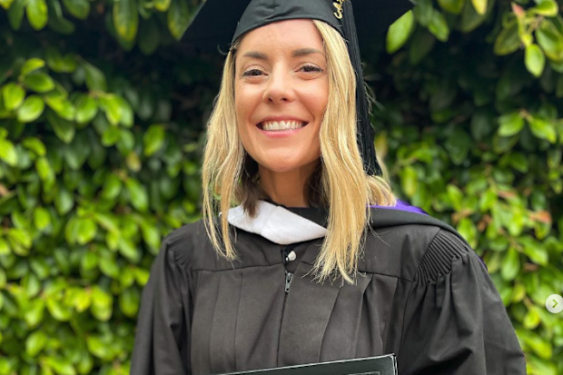 Grace Helbig with her Master's Degree.