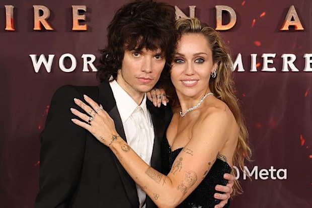Maxx Morando and Miley Cyrus at the "Avatar: Fire and Ash" World Premiere, December 2025