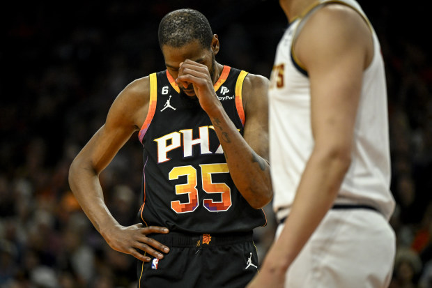 PHOENIX, AZ - MAY 11: Kevin Durant (35) of the Phoenix Suns taps his head during the second quarter against the Denver Nuggets at Footprint Center in Phoenix on Thursday, May 11, 2023. (Photo by AAron Ontiveroz/The Denver Post)