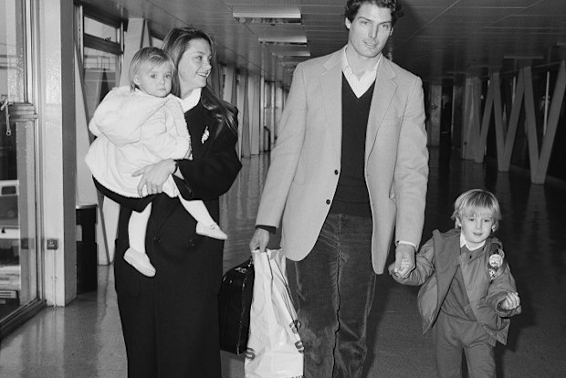 American actor Christopher Reeve (1952 - 2004) with his partner Gae Exton and their children Matthew Reeve and Alexandra Reeve Givens at Heathrow Airport, London, UK, 23rd January 1984. 