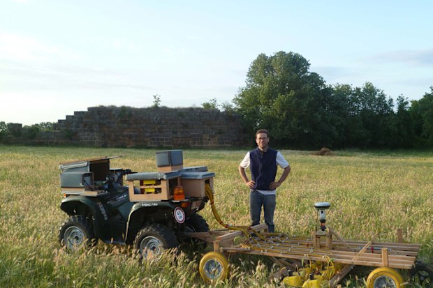 Archaeologists used an all-terrain vehicle to pull their instruments over the land.