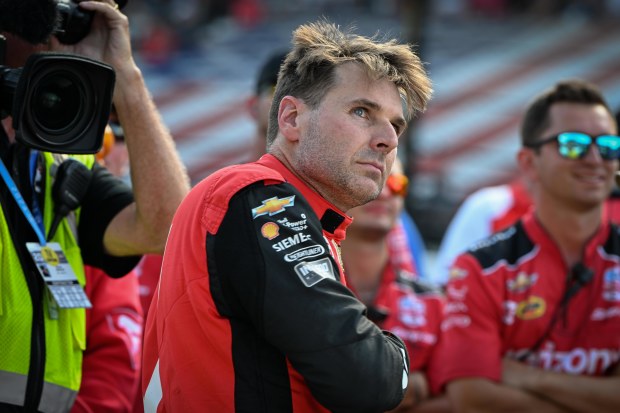 Will Power watches on during qualifying for the 108th Indianapolis 500.