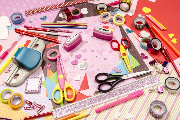 Color paper, pencils, different washi tapes, craft scissors, hearts supplies for decoration.