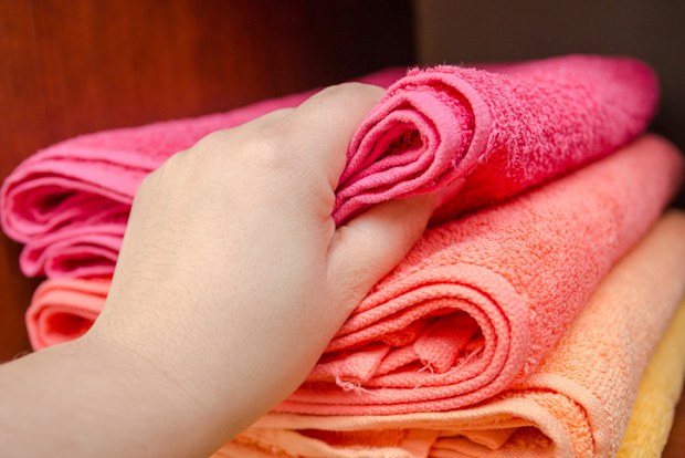 multi-colored bath towels on a white background