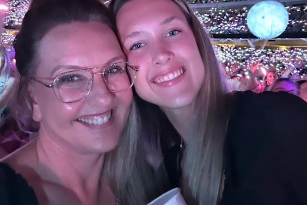 T L Swan is an Australian romance author with 27 books to her name, pictured with her daughter.