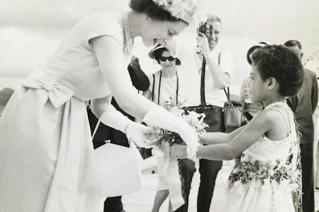 The Queen receiving a bouquet of flowers from Fijian Princess, Adi Kaunilotuma, during a visit to the country in 1963.