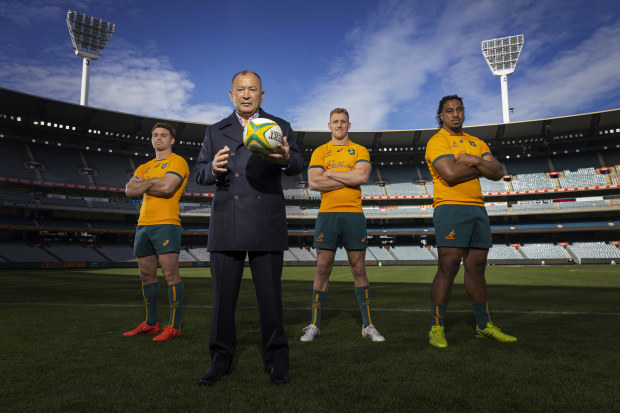 Eddie Jones with Wallabies players at the MCG.