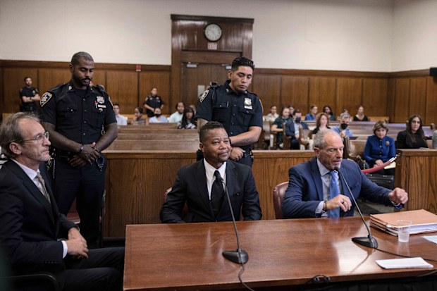 Actor Cuba Gooding Jr., centre, appears in Manhattan Criminal Court for his sexual misconduct case, Thursday, Oct 13, 2022, in New York. Gooding Jr. resolved his New York City forcible touching case with a guilty plea to a lesser charge and no jail time after complying with the terms of a conditional plea agreement reached in April.