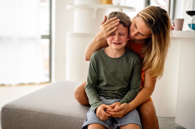 Child crying with mum. 
