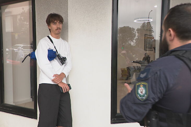 Protester speaks with police in Bondi
