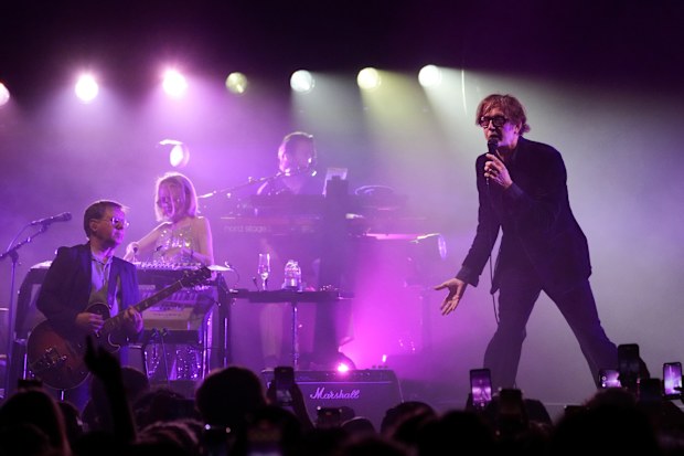 Jarvis Cocker, right, and Mark Webber, from left, and Candida Doyle, of the band Pulp.