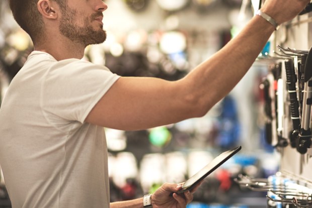 man shopping for cables.