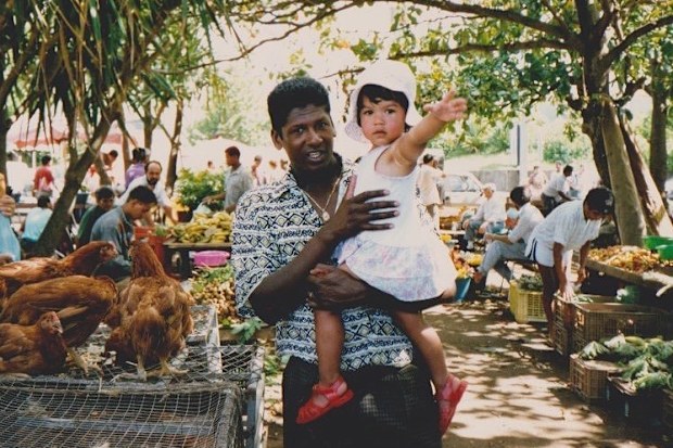 Jennifer Atilémile as a small child with her father.