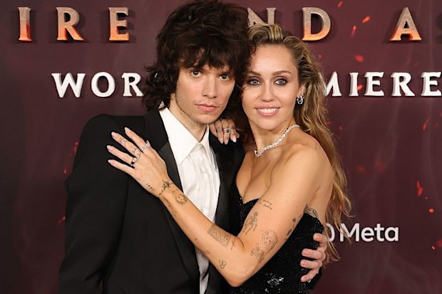 Maxx Morando and Miley Cyrus at the "Avatar: Fire and Ash" World Premiere, December 2025