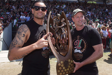 <b>After 43 years of misery Souths Sydney's legion of loyal supporters finally had their day in the sun, saluting their premiership winning heroes during a day celebration at the club's spiritual home - Redfern Oval.<br/><br/>The old ground was packed to the rafters with the euphoric scenes as the players filed in, before skipper John Sutton raised the cherished NRL trophy to a defeaning roar.</b><br/><br/>But while Sutton was feted, no one was more popular than man of the match and departing star Sam Burgess.<br/><br/>