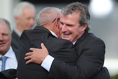 Trainer Darren Weir celebrates Trust in Gust's victory.