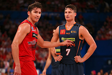 NBL players stick black tape across their jerseys.
