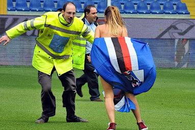 A guard looks to be in love as he goes in for the tackle. (AAP)