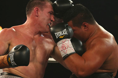 <b>Rugby league star Paul Gallen has made an exhilarating professional boxing debut, climbing off the canvas to stop Herman Ene-Purcell in two frantic rounds.</b><br/><br/>After being dropped in the first round, Gallen pounded his rival in the second, forcing the referee to stop the fight.<br/><br/>However the action didn't end there as the two fighters exchanged several more blows. <br/><br/>Gallen was on the undercard to Daniel Geale, who schooled Garth Wood. (Getty Images)<br/><br/><br/>