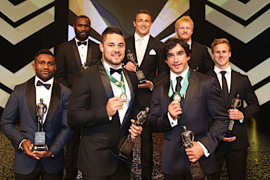 The joint winners pose in front of the Dally M team of the year. (Getty)
