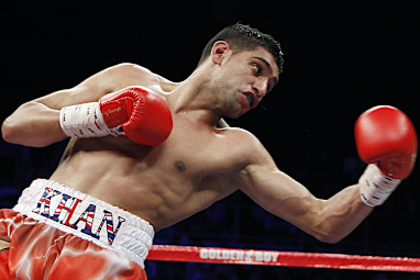 Amir Khan wore boxing shorts worth $36,000 in a bout in 2014. (AAP)