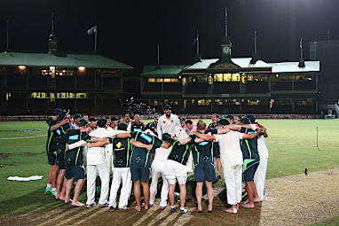 Nathan Lyon led them in song.