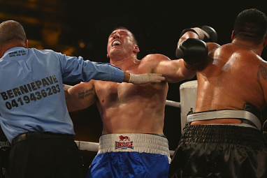 This is when things got messy. Ene-Purcell took a swing after the fight was stopped.