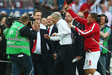 The soaking started moments after the final whistle, thanks to Lukas Podolski.