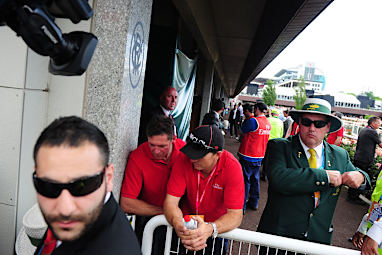 A green tarpaulin covers Admire Rakti's stall following the race. (AAP)