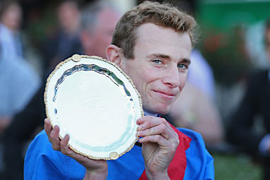 Ryan Moore poses with the Cox Plate. (Getty)