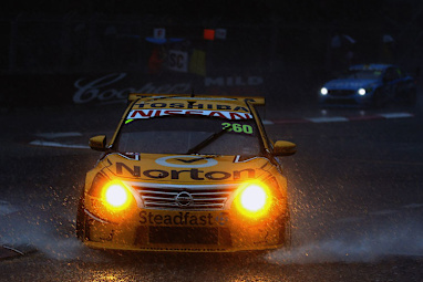 The pelting rain and darkness forced the lights to be switched on. (Getty)