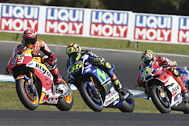 Rounding up his rivals before claiming the chequered flag.