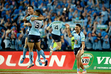 The Blues players celebrated across ANZ Stadium.