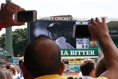 Both the crowd and players stood for a minute's silence.