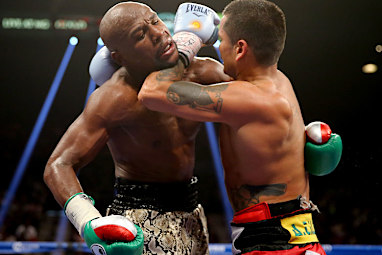 <b>Champion boxer Floyd Mayweather has claimed his 47th straight fight by beating Argentine slugger Marcos Maidana in a bad-tempered rematch that was marred by bite claims.</b><br/><br/>Mayweather, who hasn't lost a fight since the 1996 Olympics, successfully defended his World Boxing Association and World Boxing Council welterweight belts and the WBC junior middleweight belt in a unanimous points decision.<br/><br/>But the bout was engulfed in controversy as Mayweather accused Maidana of biting him.<br/>