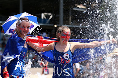 These young fans were not above jumping in a fountain. (Getty)