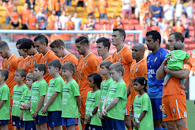 The Brisbane Roar hang their heads in silence before their A-League match.