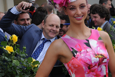 Tv commentator and former Geelong player Billy Brownless turns photo bomber.